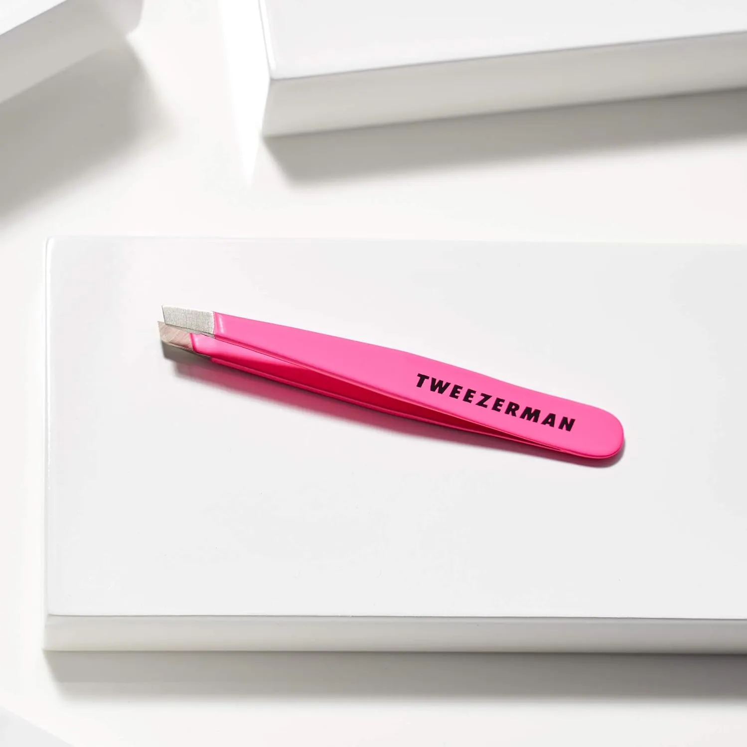 Tweezerman Mini Slant Tweezer - Tweezers for Eyebrows, Travel Tweezers for Eyebrows, Facial Hair, Ingrown Hair (Neon Pink)